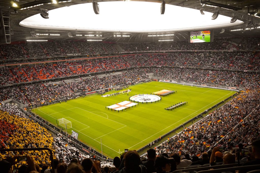 Why International Breaks Have Such a Big Impact on Club Football National teams lining up on the pitch before an international football match